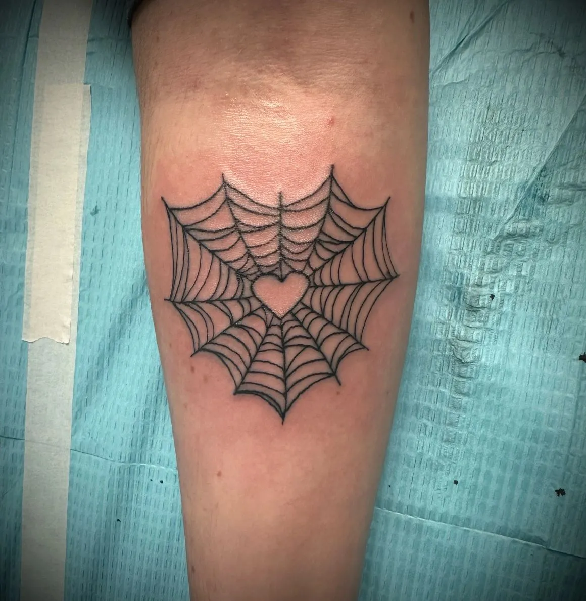 Ornamental fine-line mandala tattoo
