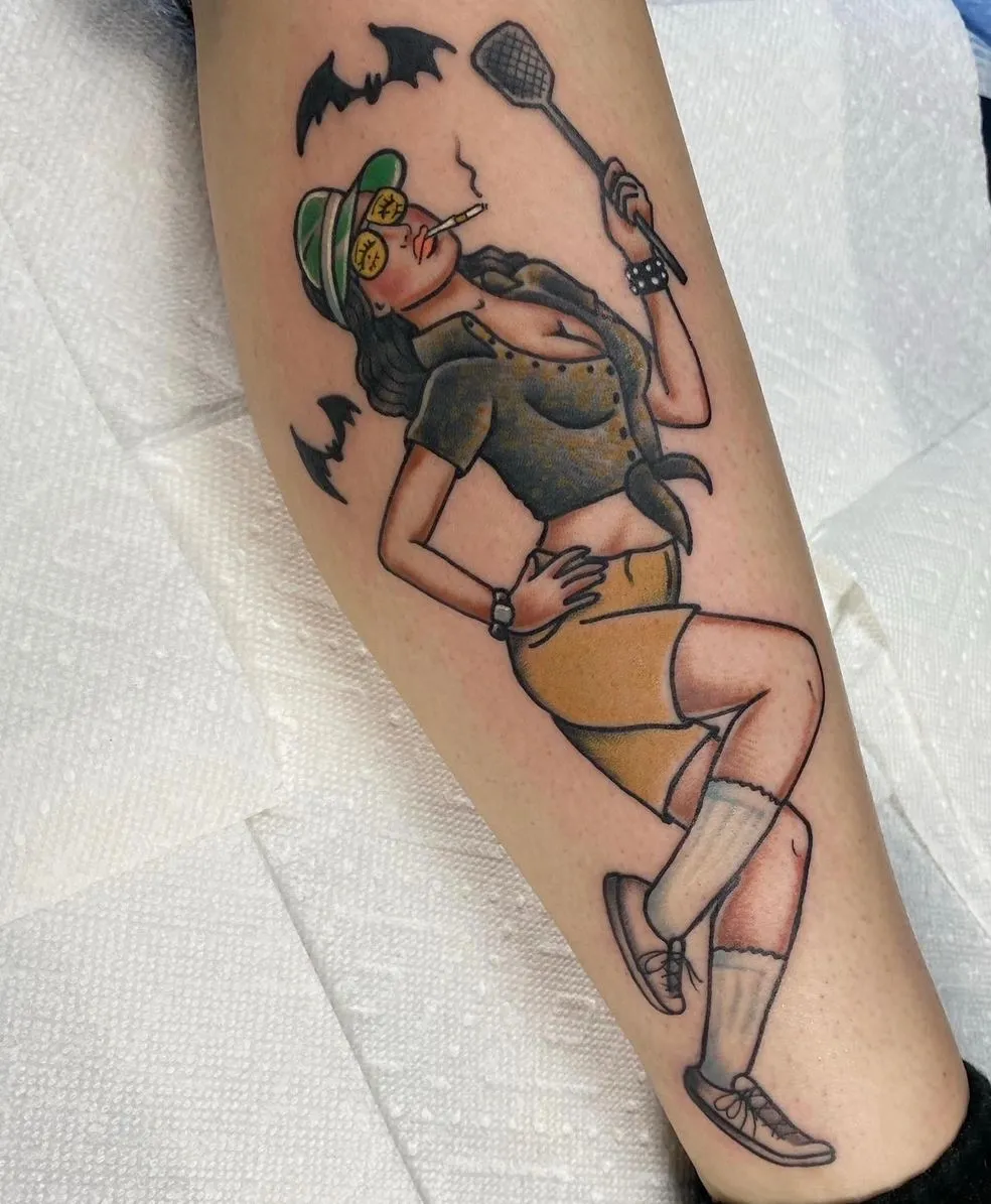 Color portrait and architecture arm tattoo